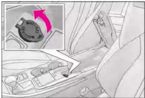 Diagram showing car seatbelt mechanism with a magnified inset highlighting the rotary dial and speed limit.