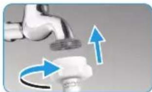 Close-up of a faucet with blue arrows indicating clockwise motion (no text or symbols)