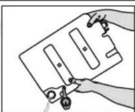 Illustration of hands holding a rectangular object with three vertical strips and a small circular component, no text or symbols present.