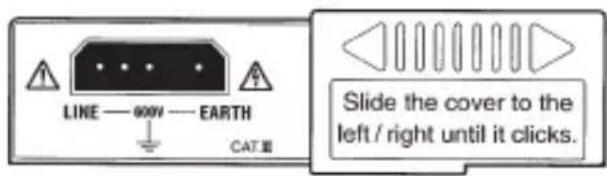 LINE — 600V — EARTH CAT RE Slide the cover to the left / right until it clicks.