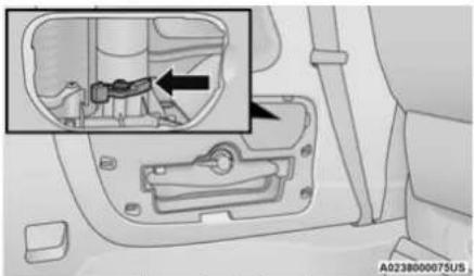 Technical diagram showing a car interior with a highlighted component and directional arrow indicating assembly or inspection.
