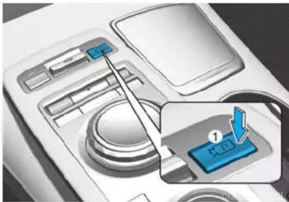 Diagram showing a device control panel with a blue button labeled '1' pointing to a button, indicating a step in operation.