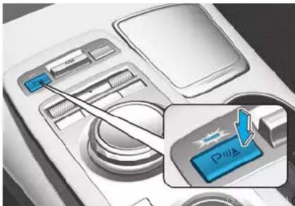 Diagram showing a device control panel with a blue button labeled 'P11A' and an arrow pointing to it, indicating action or operation.