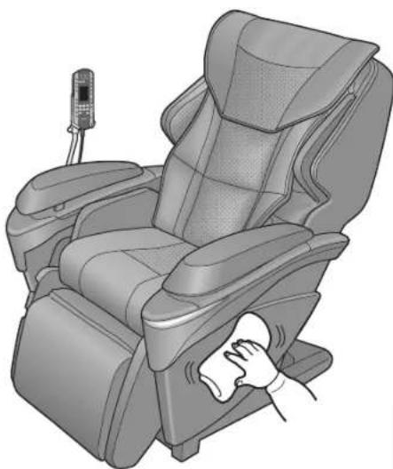 Illustration of a modern massage chair with a hand cleaning the seat (no text or symbols).