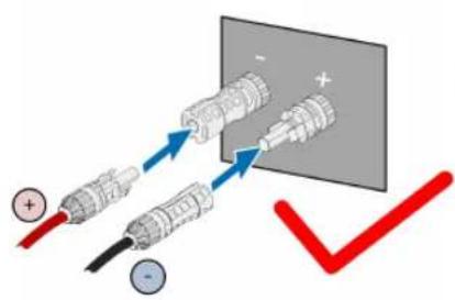 Diagram illustrating electrical connections with positive and negative terminals, showing wiring and polarity indicators