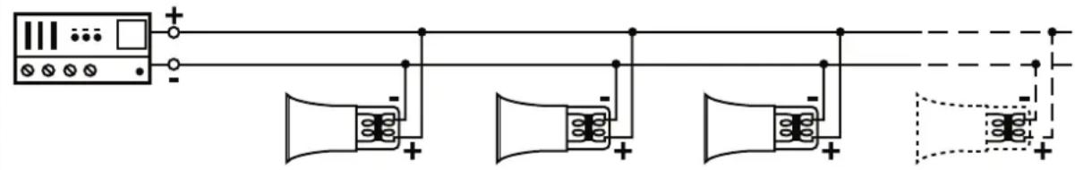 Electrical circuit diagram showing connections between a power supply, three speakers, and a fuse with polarity indicators.