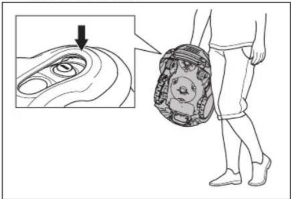 Medical illustration showing a hand holding a device with an eye inset, illustrating the procedure to reduce the eye.