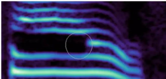 Abstract pattern of glowing blue and cyan horizontal bands with a white circle highlighting a dark center (no text or symbols)