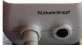 Rückstellknopf