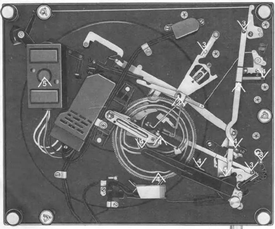 Interior view of an electronic device with mechanical components and wiring (no visible text or symbols).