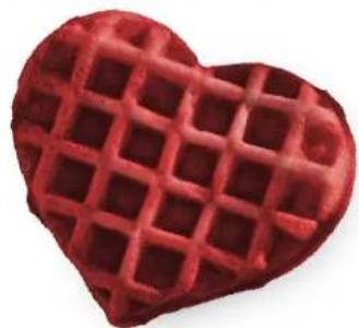 Heart-shaped red waffle cake with lattice pattern (no text or symbols)