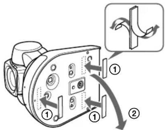 Diagram of a camera module with labeled parts and directional arrows indicating motion or assembly steps
