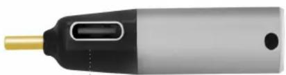Close-up of a handheld electronic device with a metallic tip and black body (no visible text or symbols)