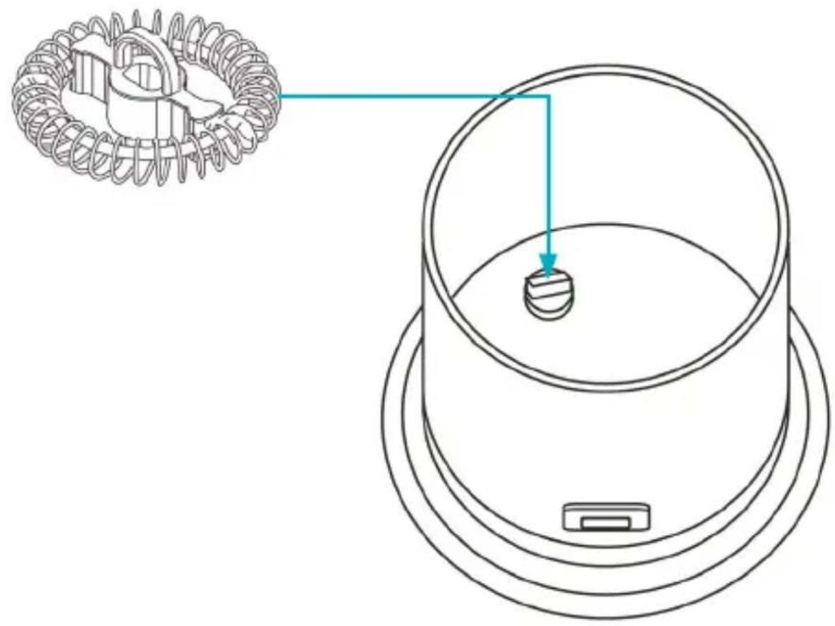 Technical diagram showing a mechanical component with a magnified inset and a labeled arrow pointing to a central feature.