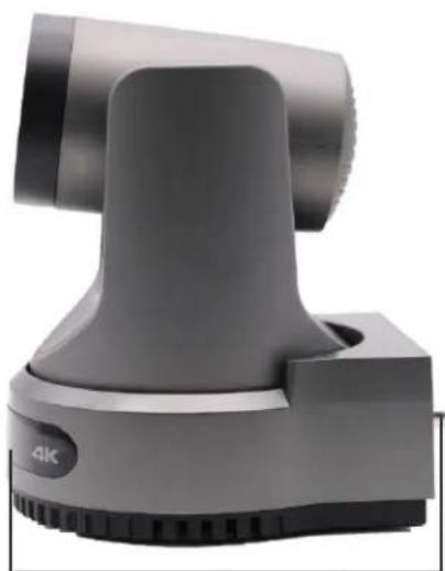 Close-up of a gray handheld vacuum cleaner with a 4K indicator button (no text or symbols on the device itself)