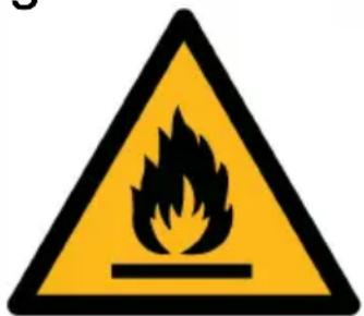 Warning sign depicting a flame symbol with black smoke inside a yellow triangle