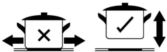 Diagram showing two cooking pots with directional arrows and checkmark indicators, likely indicating cooking or cooking process.