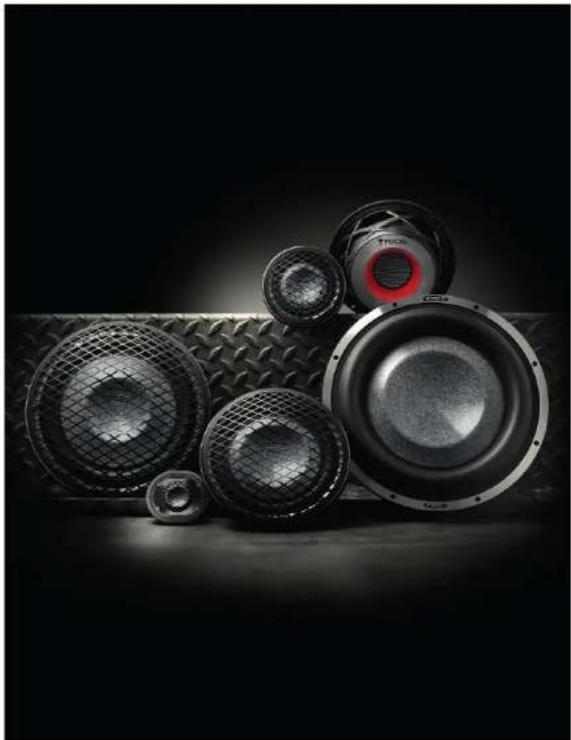Black-and-white photo of multiple speakers with mesh grilles and a red circular logo, no visible text or symbols.