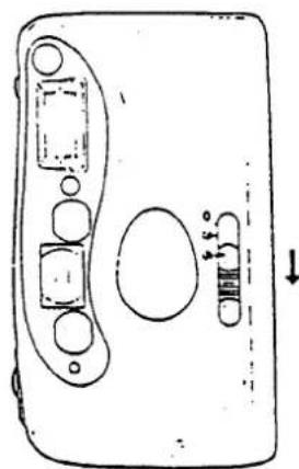 Diagram of a device casing with labeled components and directional arrow, showing internal compartments and housing areas.