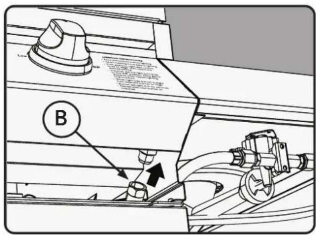 Technical diagram showing mechanical assembly with labeled component B and directional arrows indicating movement or force