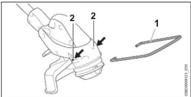 STIHL FSA 30 - Ataşarea distanțierului - 1
