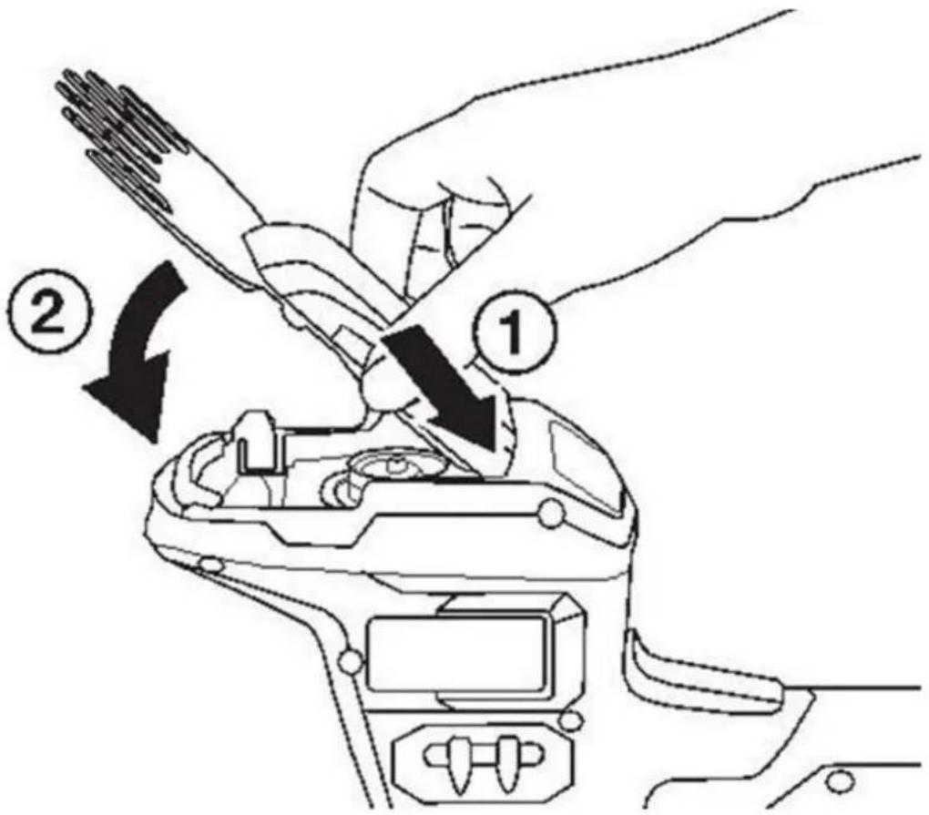 Diagram showing a hand using a tool to adjust the internal components of a mechanical device, labeled with parts 1 and 2.