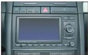 Control panel interface with display screen and warning icons, likely from a vehicle or industrial control system