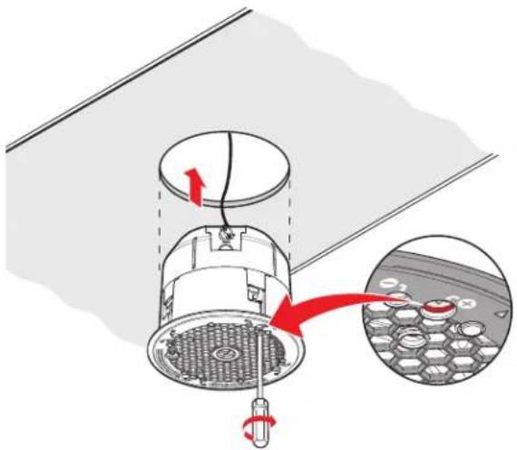 Diagram showing a mechanical assembly with labeled components and directional arrows, including a magnified inset of a grid-like component.