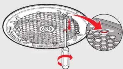 Diagram showing a screwdriver inserted into a circular component with a magnified view highlighting the internal structure.