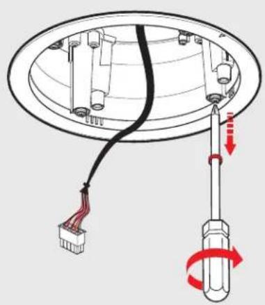 Diagram showing a screwdriver inserted into a circular component with wiring, indicating rotation or adjustment.