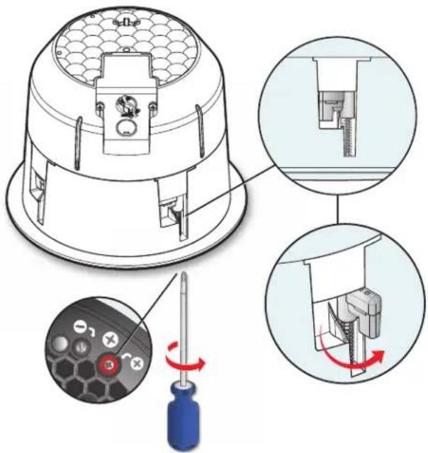 Technical diagram showing a mechanical assembly with labeled parts and a screwdriver tool, illustrating a machining process.