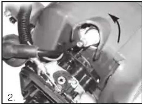 Close-up of mechanical components with a curved arrow indicating motion or direction (no visible text or symbols)