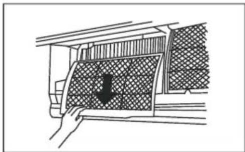 Diagram of a car interior showing a hand pressing down a textured panel with a black arrow indicating downward motion (no text or symbols present)