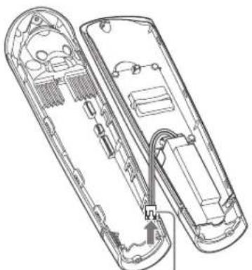 Technical line drawing of a remote control casing with internal components and wiring (no text or symbols)