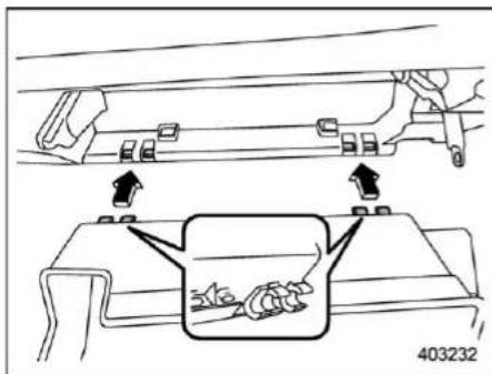 Technical diagram showing mechanical assembly with directional arrows and a magnified inset highlighting a component detail.