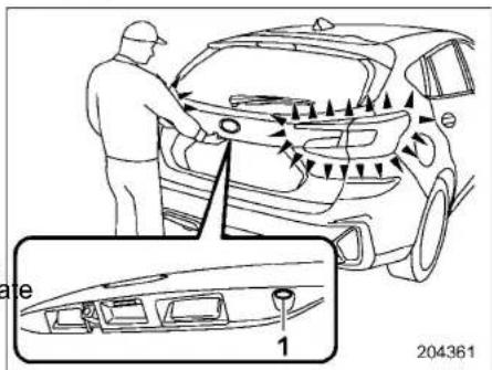 Diagram illustrating car maneuvering with directional arrows and labeled parts, including a magnified inset showing vehicle interior details.