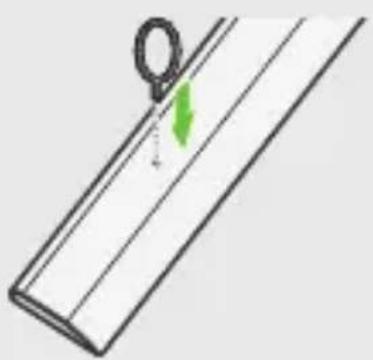 Einfache Strichzeichnung eines rechteckigen Objekts mit einem Aufhänger und einem grünen Pfeil, der die Richtung anzeigt (kein Text oder Symbole)