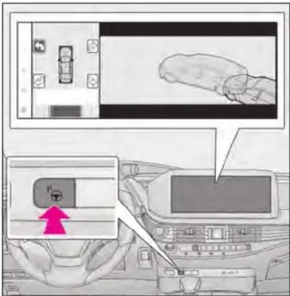 Diagram showing car interior and dashboard with a hand pointing to a device, including a magnified view of the dashboard screen.