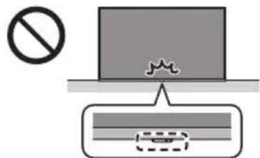 Diagram showing a prohibition symbol and a circuit with waveform and dashed line, likely indicating a protection or resistance setup.