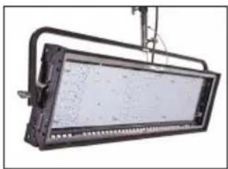 Exterior view of a black rectangular industrial lamp or fixture with a metal frame and vertical supports (no visible text or symbols)