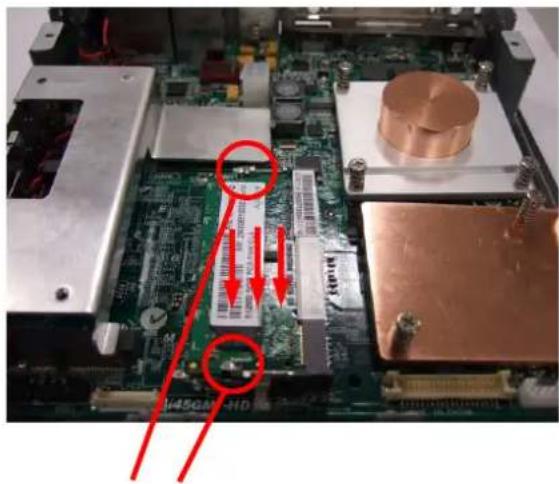 Photo of a computer motherboard with visible component labels and red annotations highlighting features