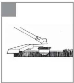 Simple line drawing of a hand operating a lever above a block (no text or symbols)