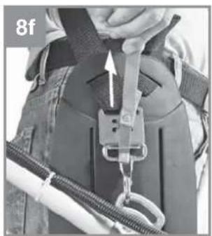 Person wearing safety harness and harness with attached straps and rope (no visible text or symbols)