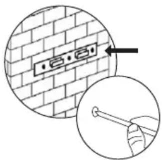 Diagram showing brick wall installation with a labeled component and magnified detail of a tool inserted into a wire.