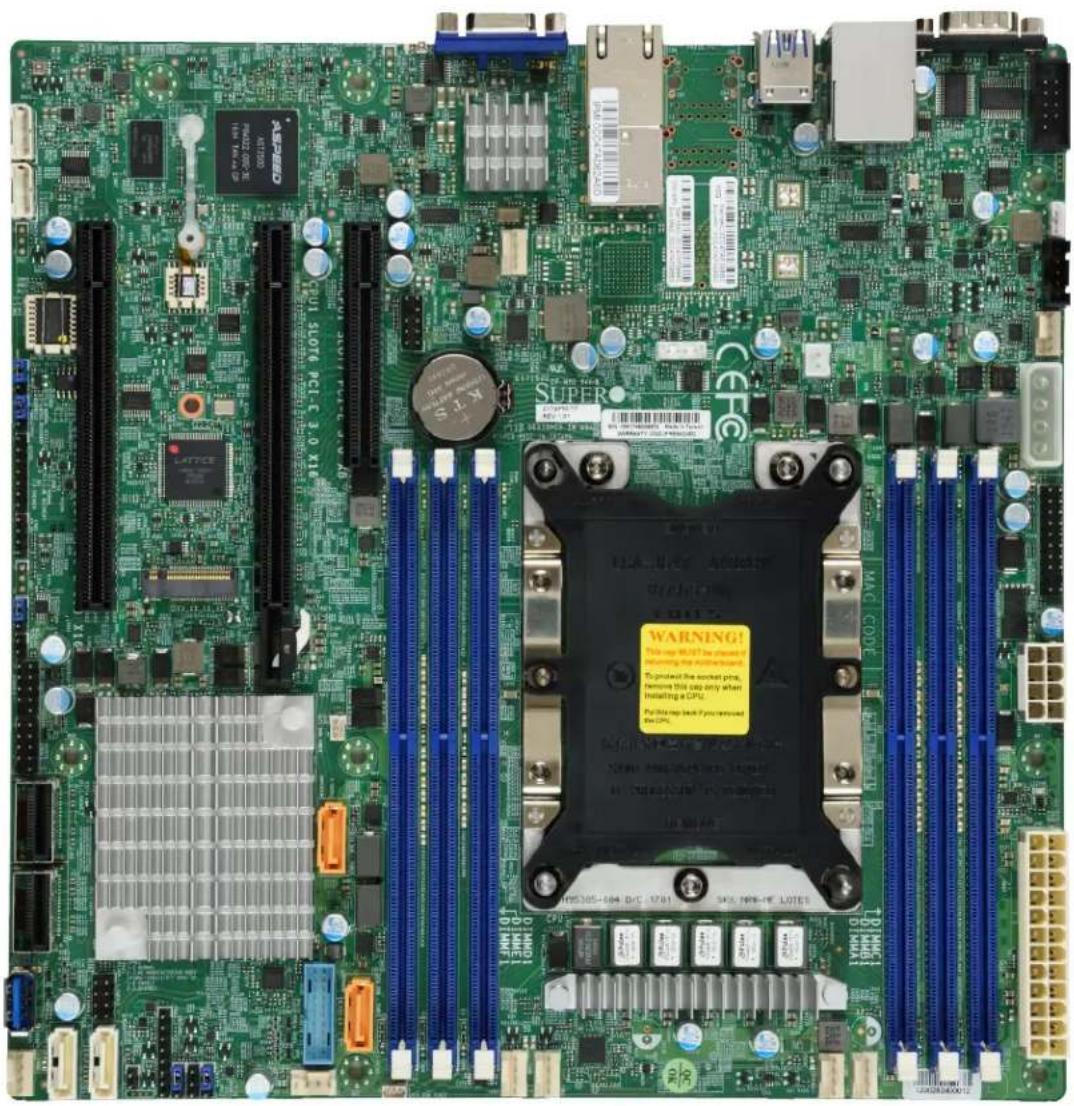 Close-up of a green computer motherboard with visible CPU socket, RAM slots, and various ports (no readable text or symbols)