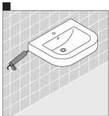 Line drawing of a standard square sink with a handle, placed on a tiled floor (no text or symbols)