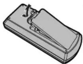 Illustration of a flat electronic device with a clip and handle (no text or symbols)