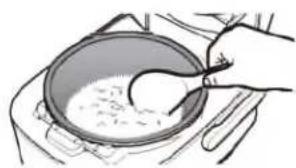 Zojirushi NW-JEC18 - Loosen and level the surface of the rice that is being kept warm. - 2