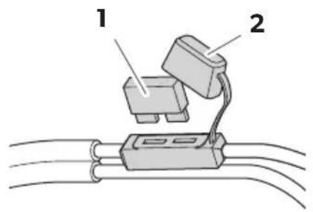 Diagram showing two labeled components (1 and 2) connected to a cable with wires, likely illustrating a mechanical or electrical assembly.