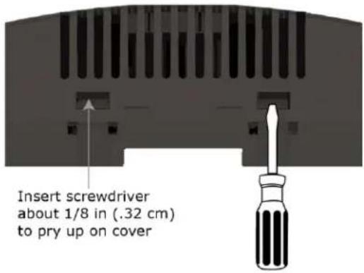 Insert screwdriver about 1/8 in (.32 cm) to pry up on cover